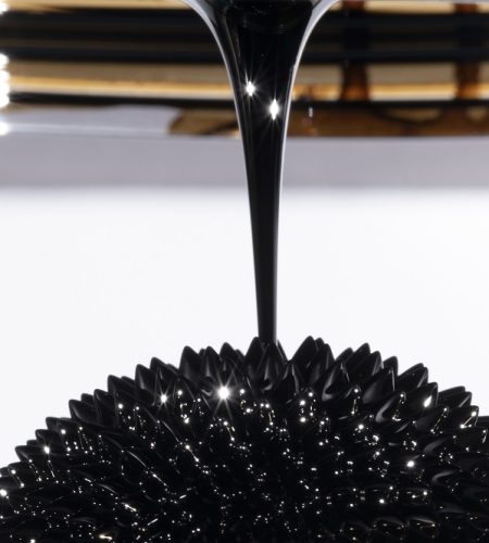 sharp upside down spike with abstract ferromagnetic mirrored metal